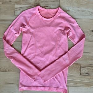 Lululemon Swiftly Long Sleeve size 4 in coral orange. Standard length